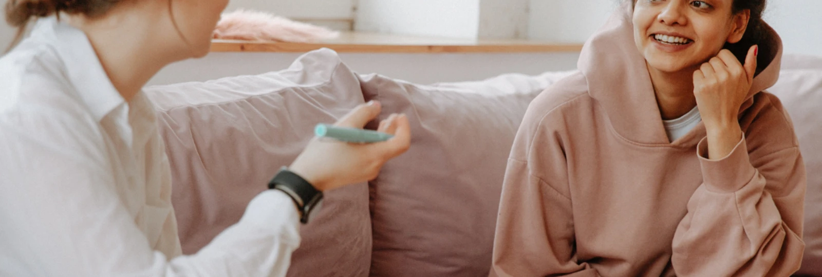image of two women talking