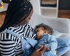 woman breastfeeding baby