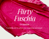 Smear of hot pink lipstick with the big title "Flirty Fuschia". Below in smaller font says "Ovulation" and "A striking pink to reflect your magnesium and allure."